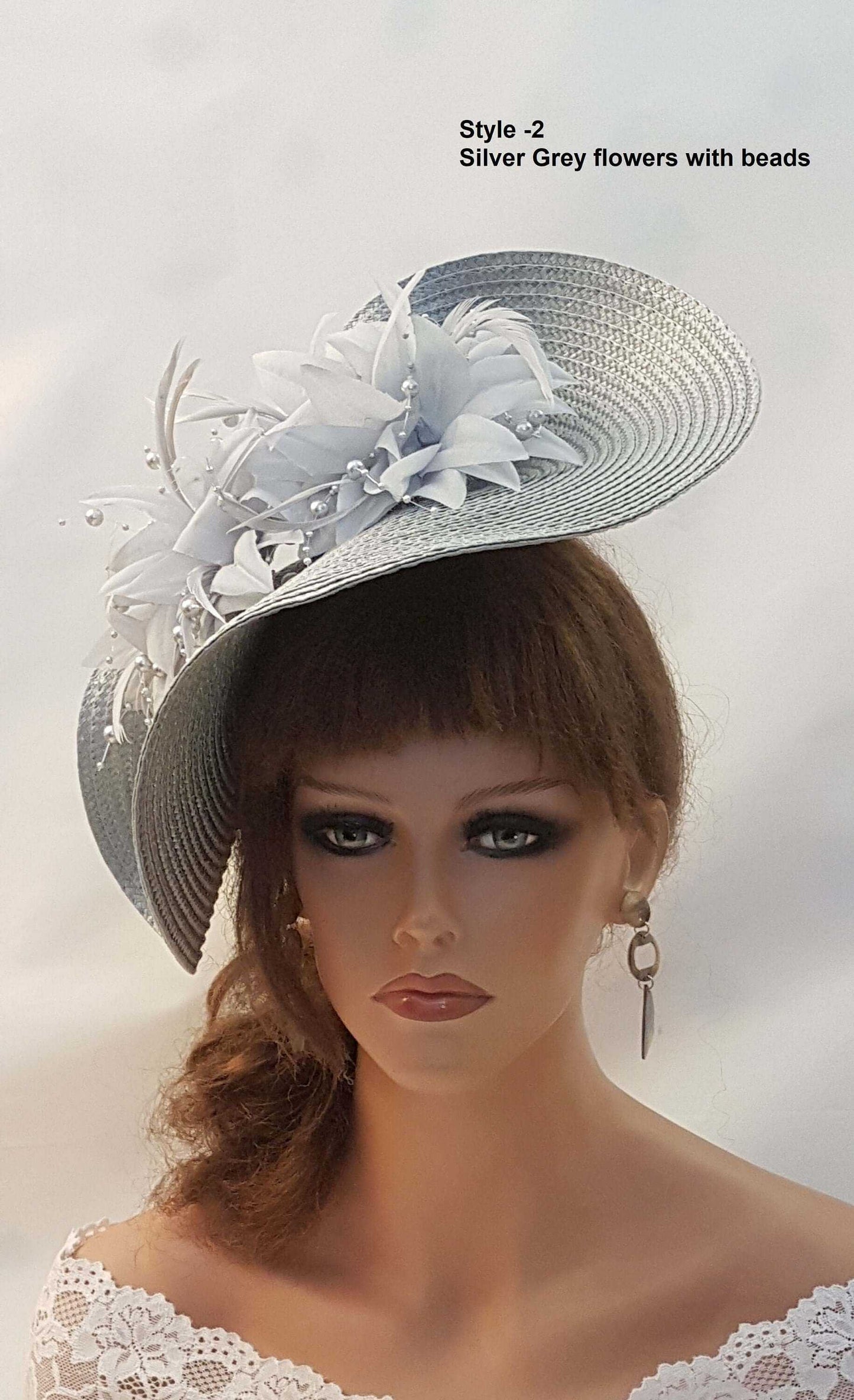 Silver Grey fascinator with quill feather and flowers, ideal for weddings and races.