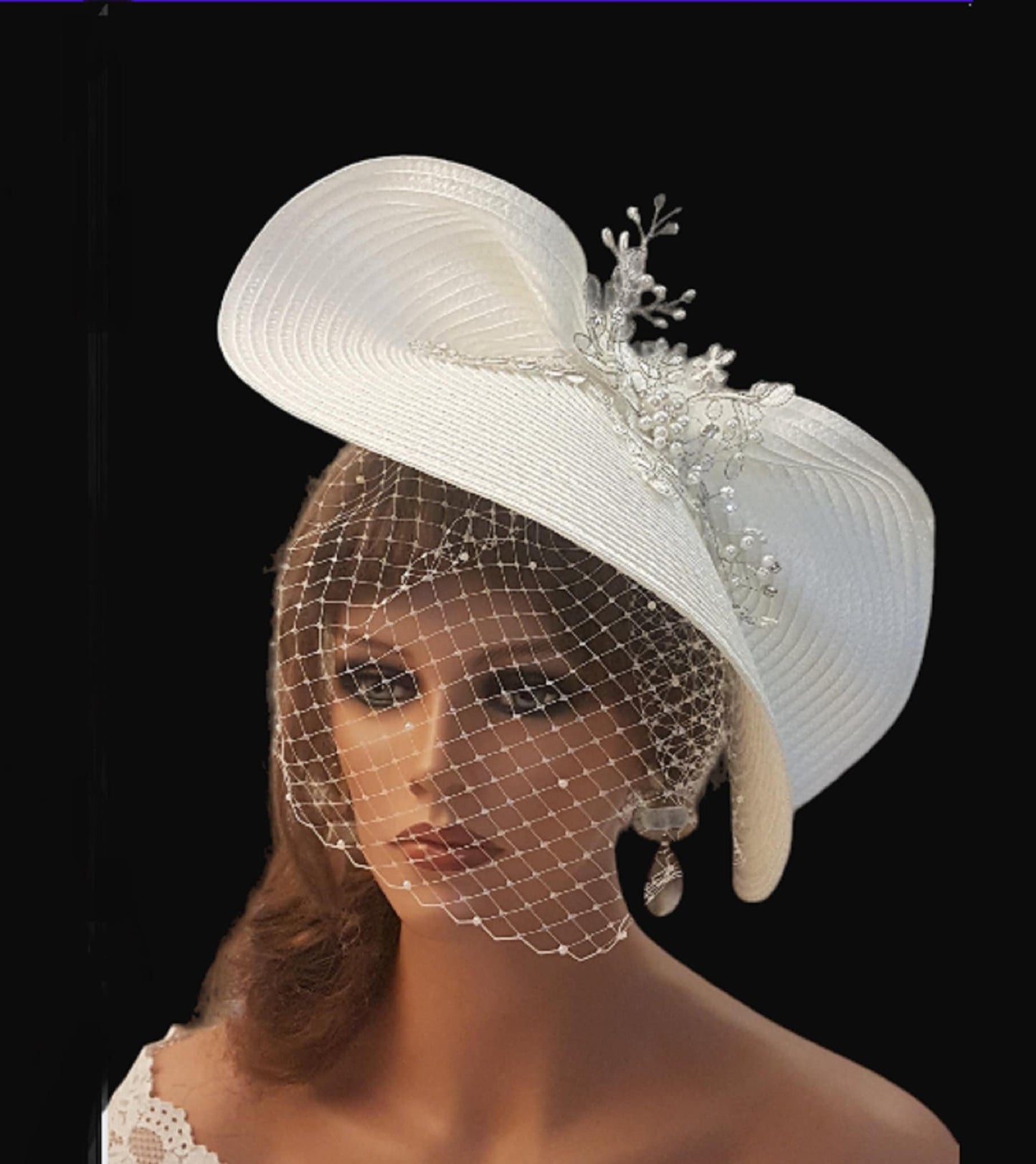 FASCINATOR with veil White Modern Bridal wedding headdress with Birdcage Veil. Adorned with stunning Silver thread Motif and with gently floating Pearls and crystals