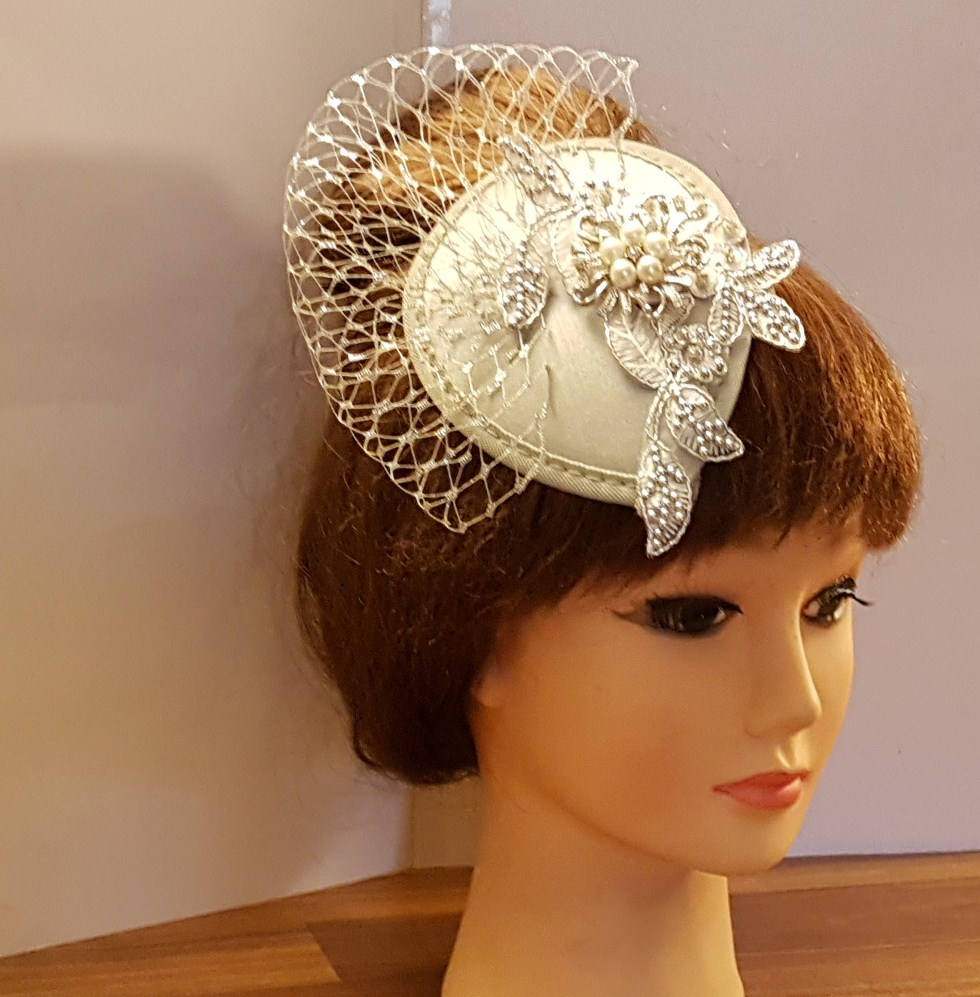 Bridal hat fascinator Metalic Silver mini hat Fascinator.