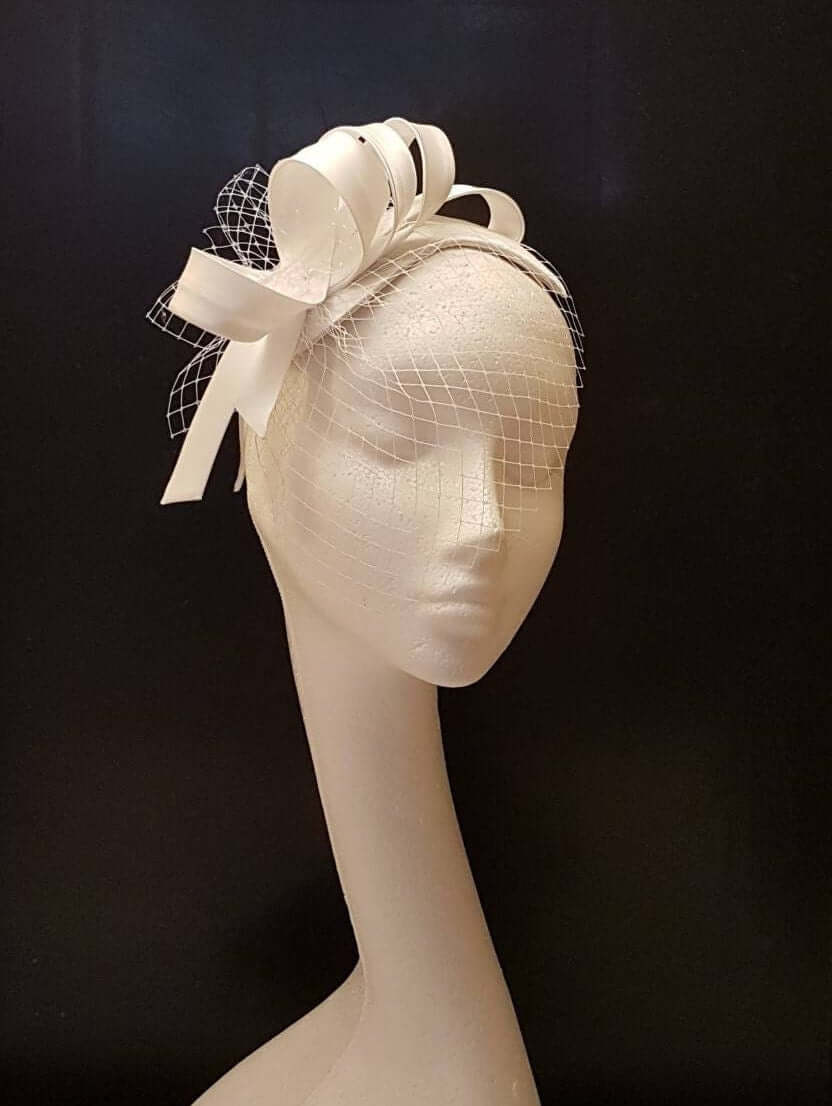 White bridal hat fascinator with mini face veil