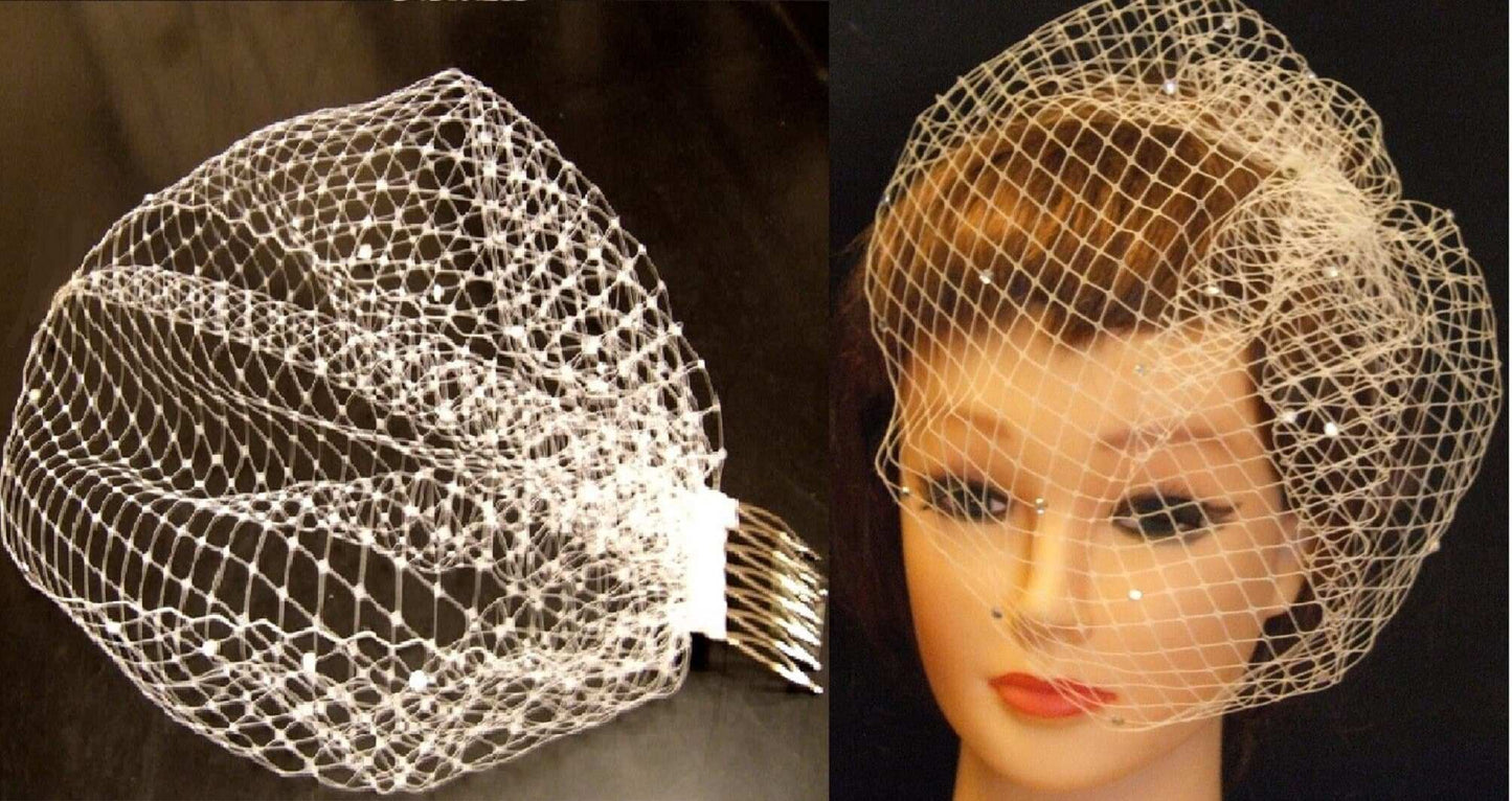 Bridal hat fascinator with birdcage veil, unique asymmetrical design with pearl and crystal adornments.
