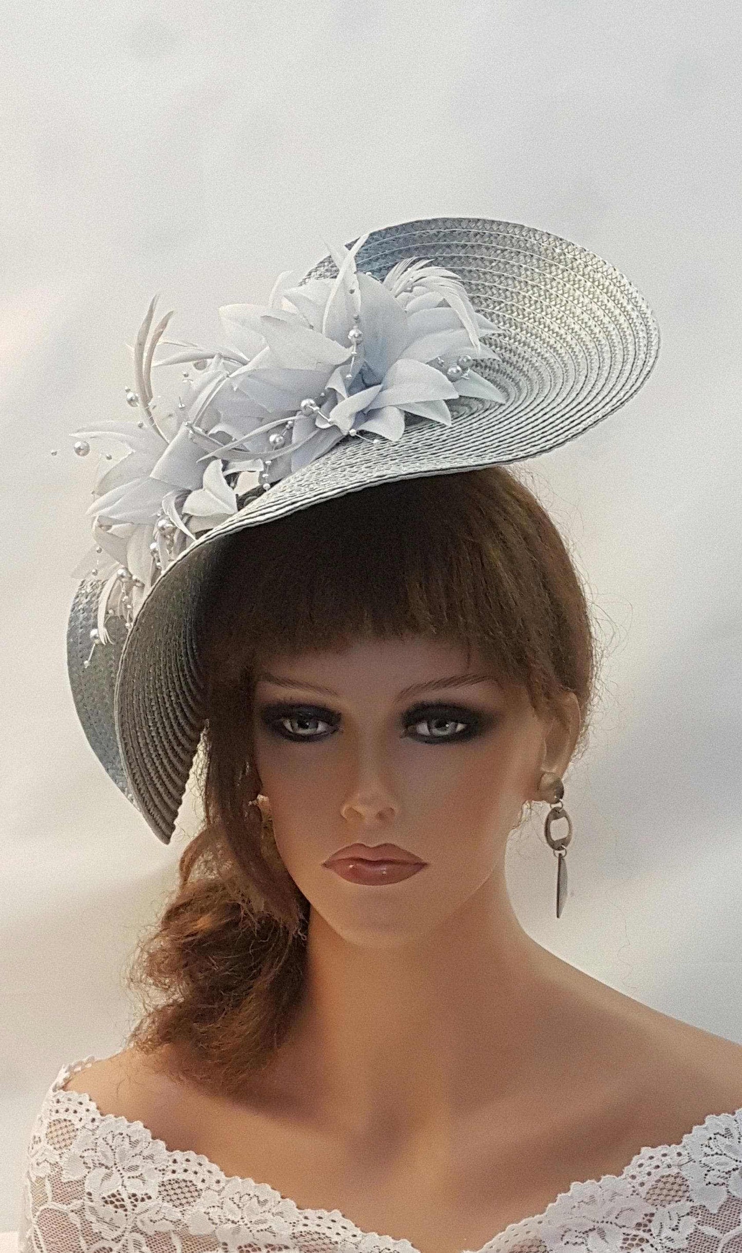 SILVER Grey fascinator with long quill feather and silk flowers, ideal for weddings and events.