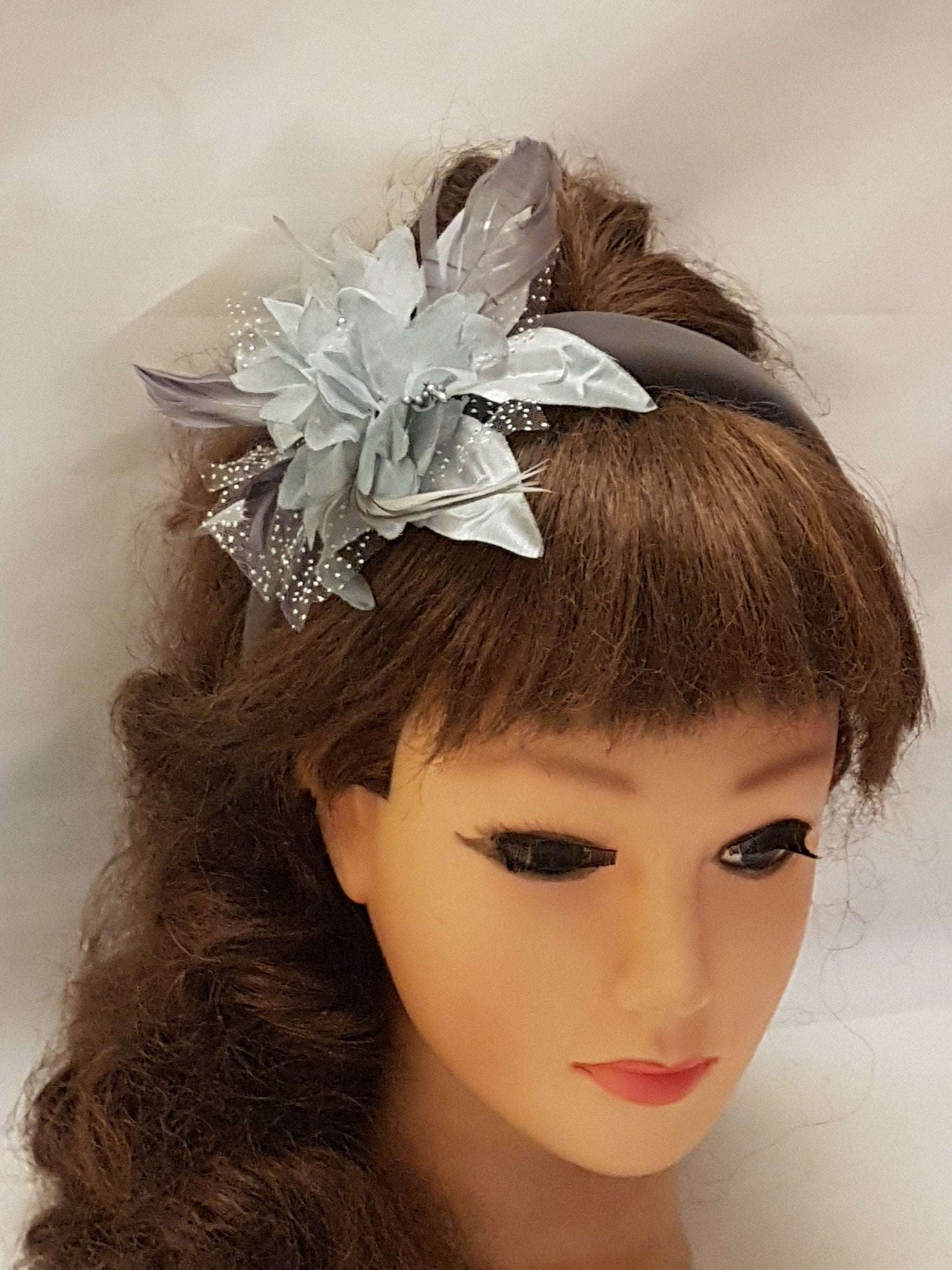 Silver grey padded suede headband with feather flower fascinator for weddings and proms