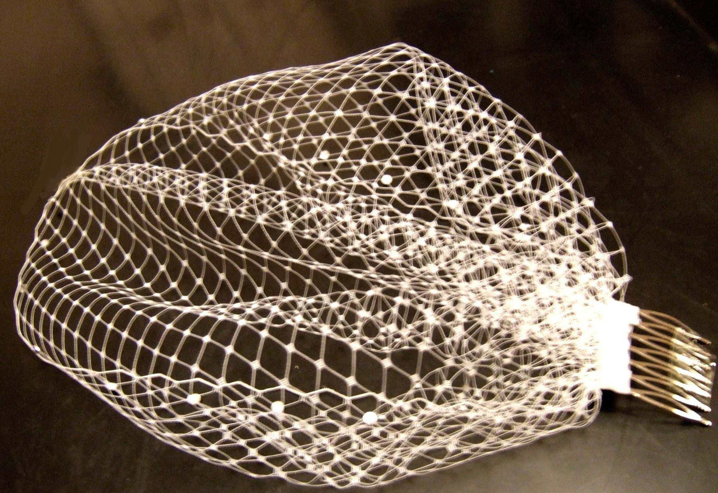 BRIDAL BIRDCAGE VEIL FASCINATOR with vintage sparkle and crystal embellishments.