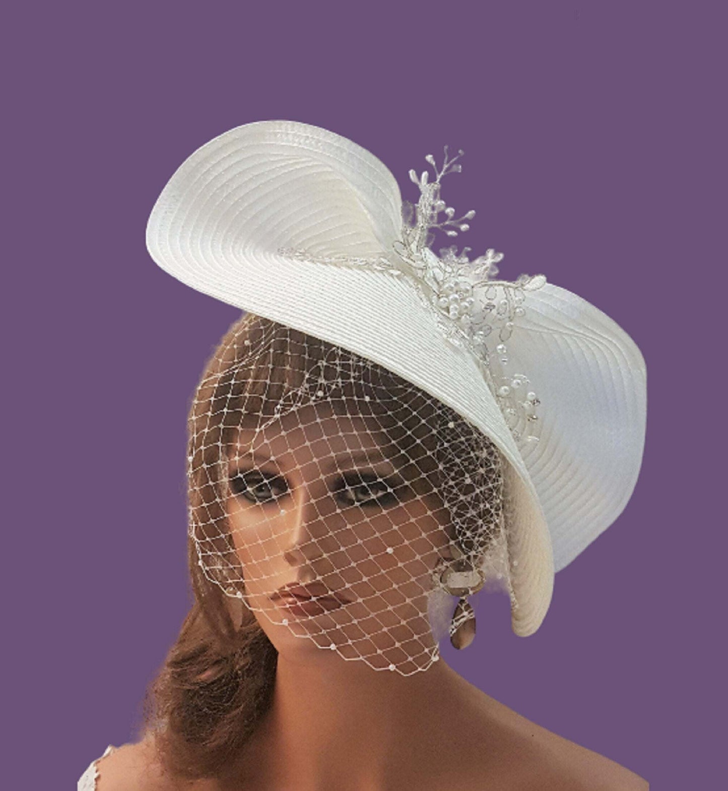 FASCINATOR with veil White Modern Bridal wedding headdress with Birdcage Veil. Adorned with stunning Silver thread Motif and with gently floating Pearls and crystals