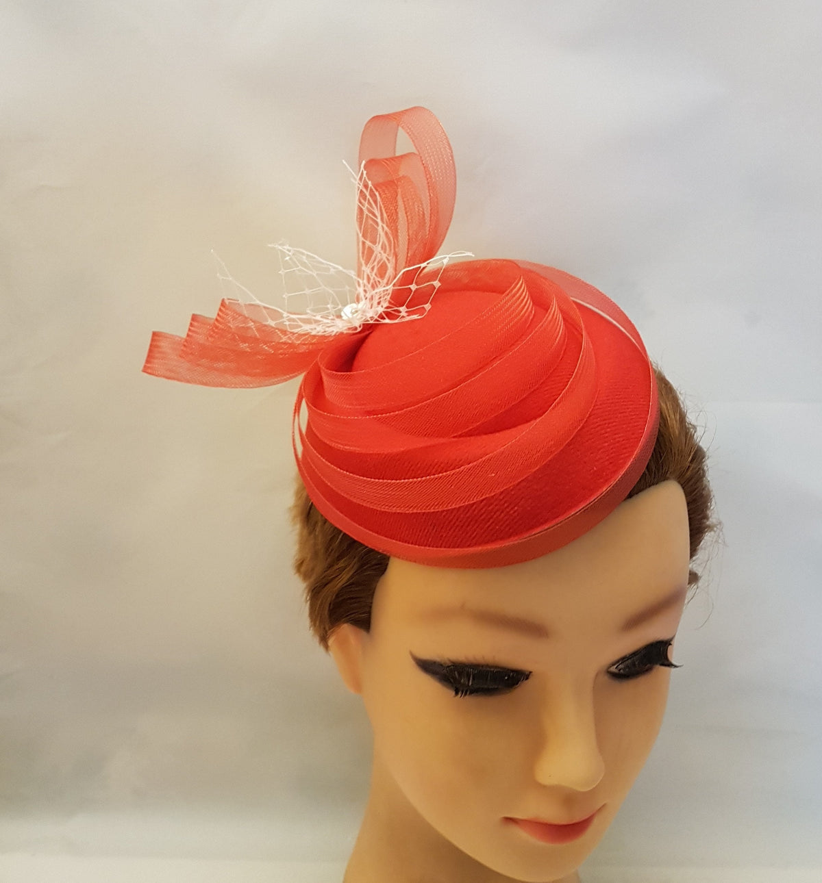 Red fascinator for tea party