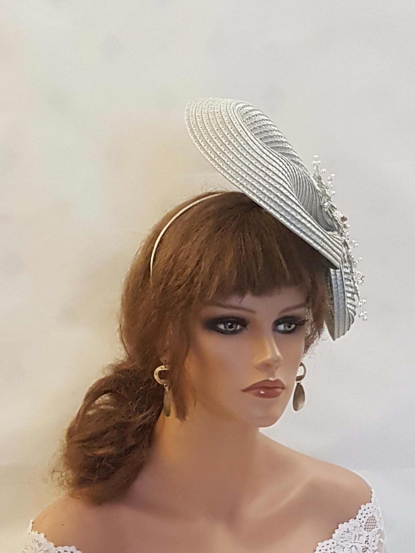 Silver grey mother of the bride fascinator hat. Fascinator for weddings, races, and parties