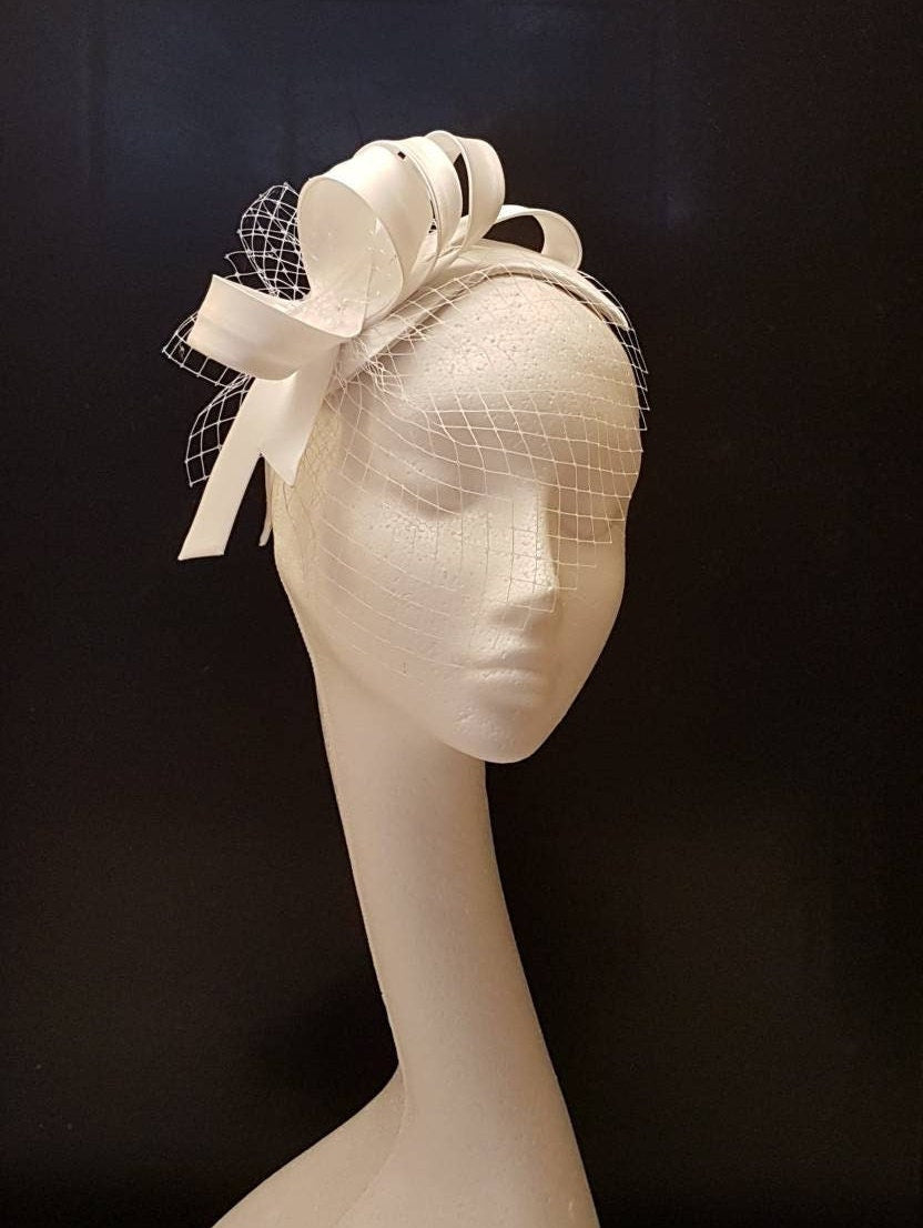 White bridal hat fascinator with mini face veil 