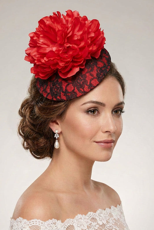 black and red hat fascinator with a large peony flower.