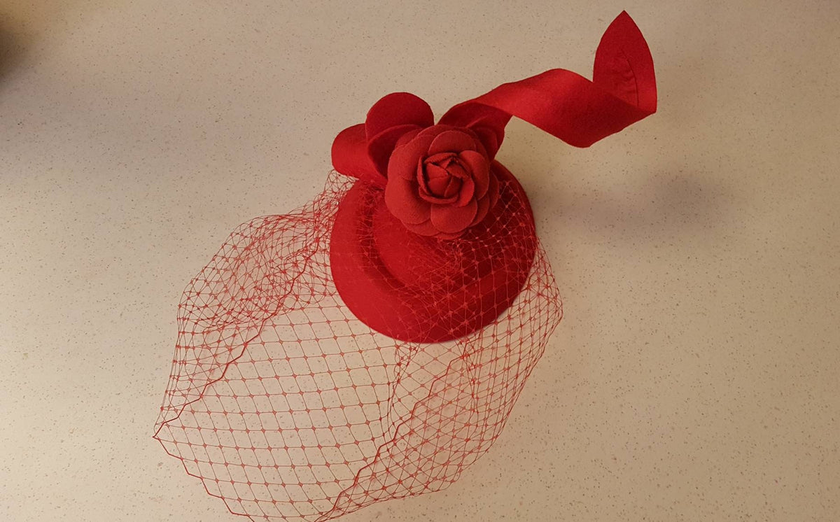 Red birdcage veil felt fascinator