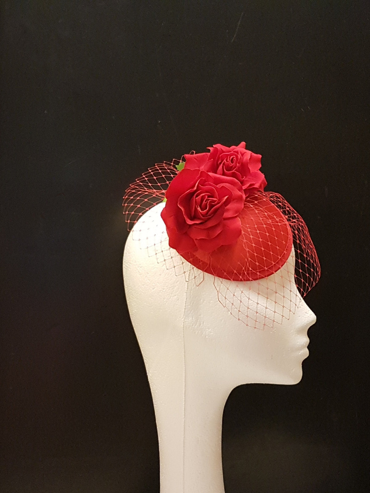 red  birdcage veil fascinator