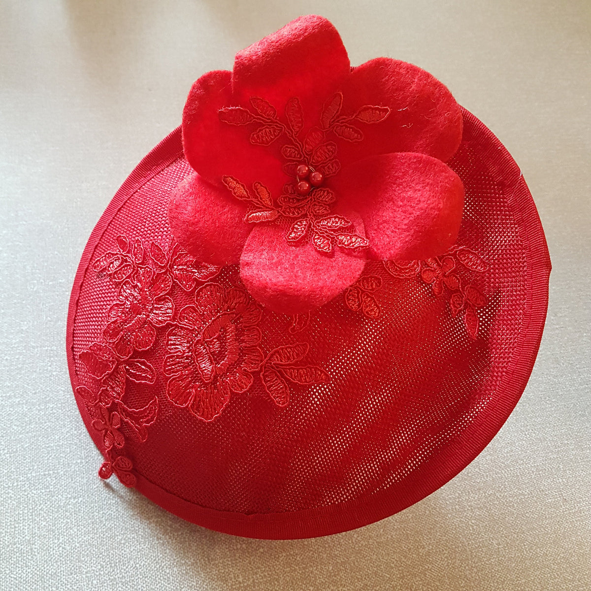 RED Sinamay Hat with Beautifull Handmade Felt flower and Floral Motif