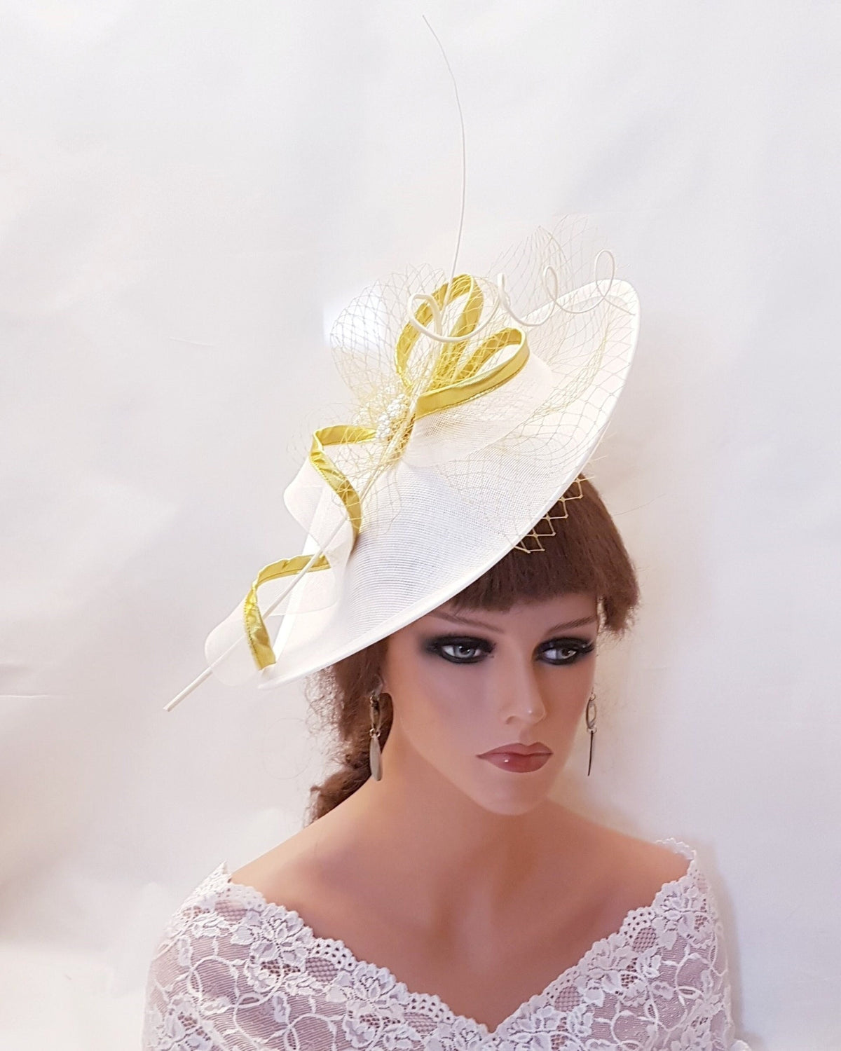 White mother of the bride hat fascinator with gold edge crinoline swril