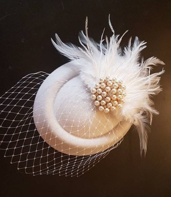 White Pillbox hat fascinator with veil for the bride