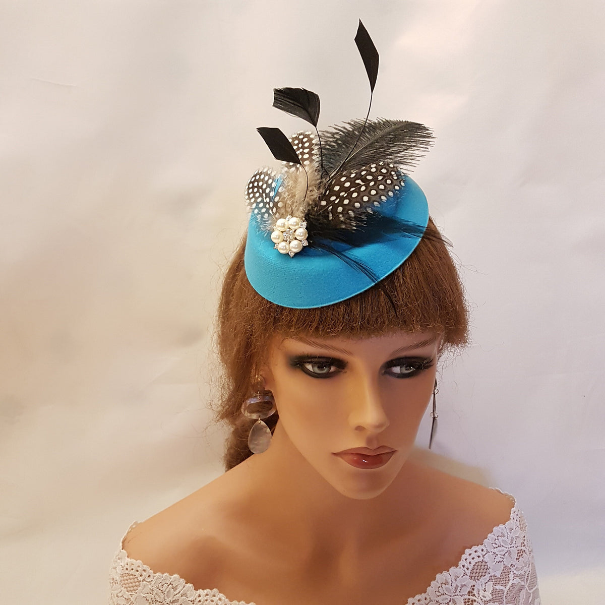 Turquoise blue felt like Pillbox hat fascinator with feathers