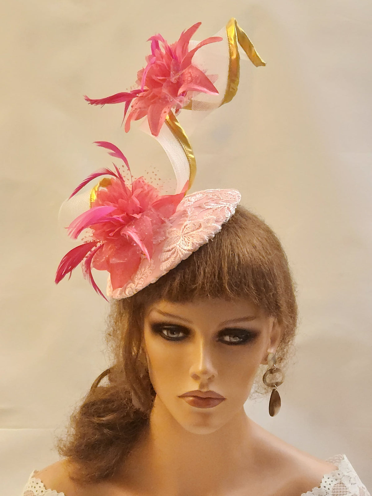 pink fascinator hatcwith long crinoline swril