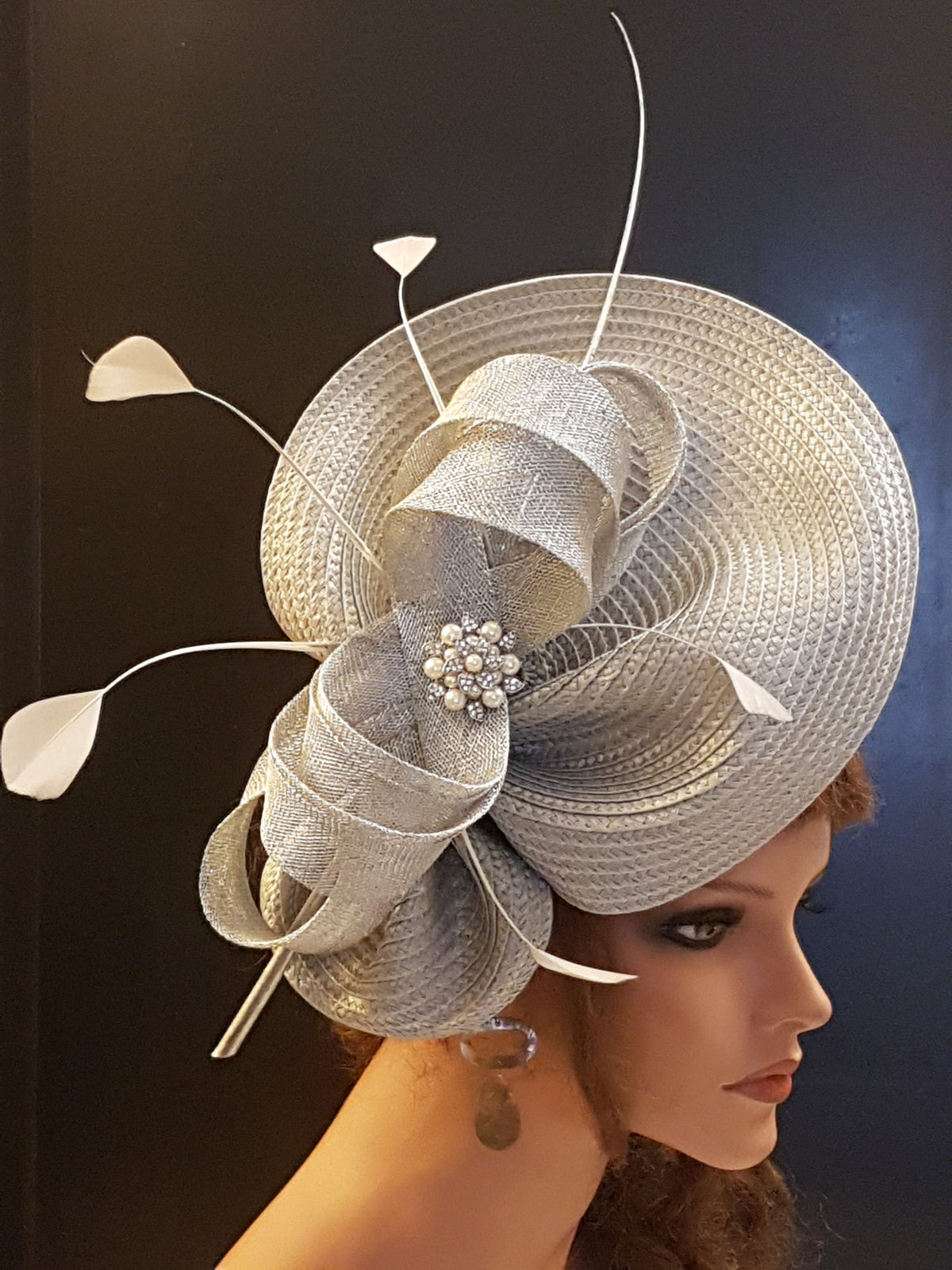 Silver fascinator with Feathers