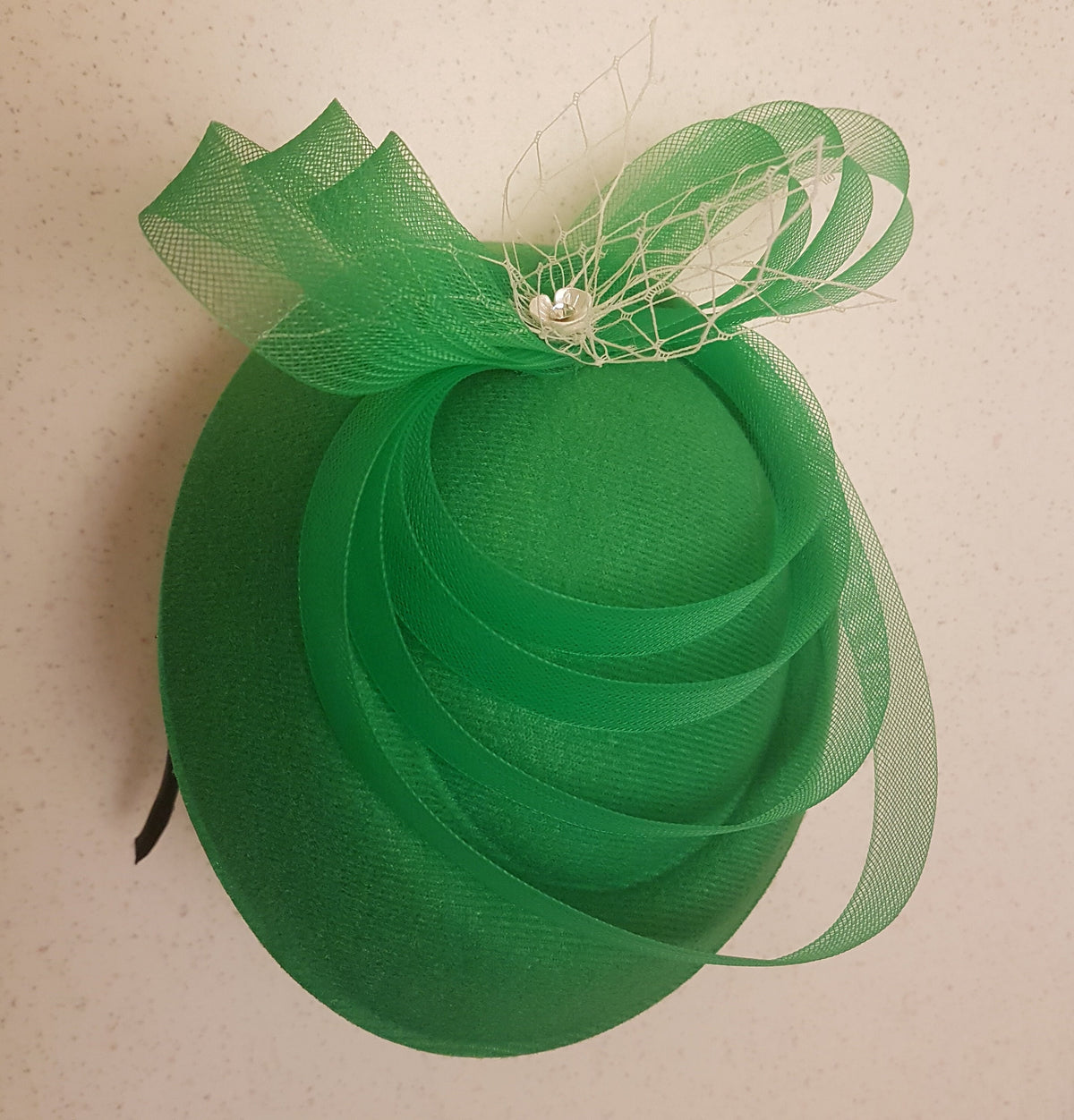 Green pill boxhat fascinator