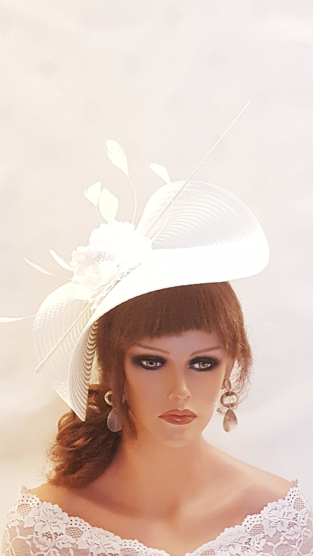 White mother of the bride hat fascinator. White wedding hat fascinator. White straw weave fascinator hat