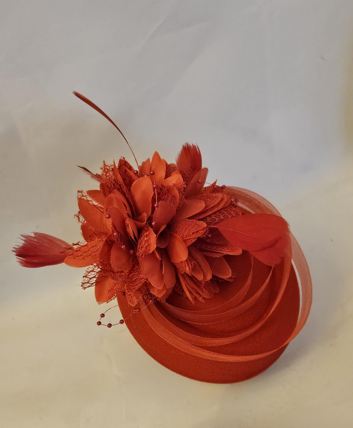 Red fascinator