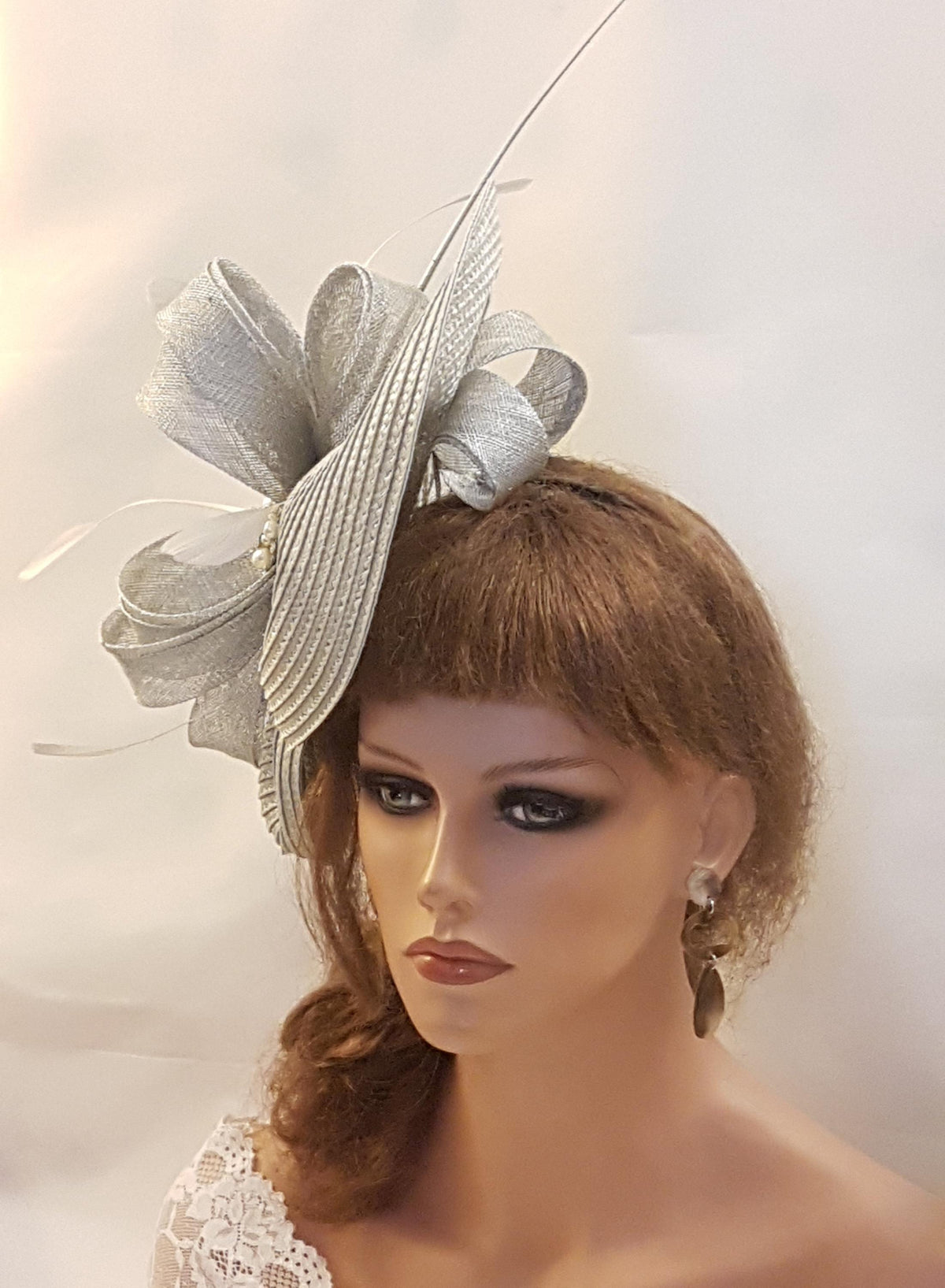 Large Silver Grey hatinator with Sinamay  loops and feathers
