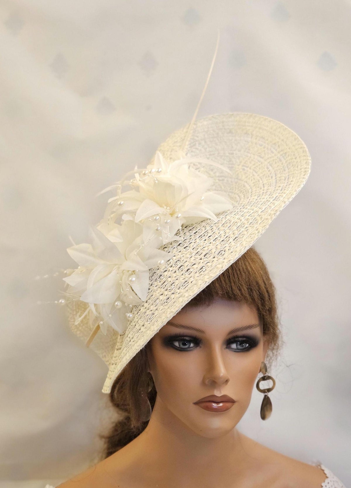 Ivory Kentucky derby at fascinator. Hat for Race and wedding