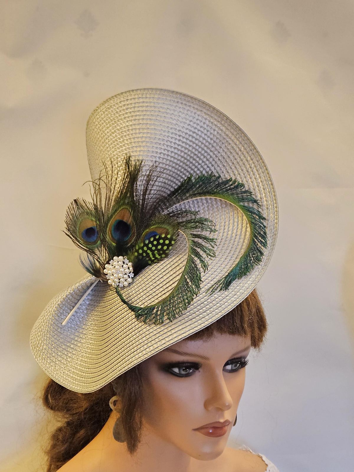 Silver Grey Mother of the bride fascinator with Peacock Feathers