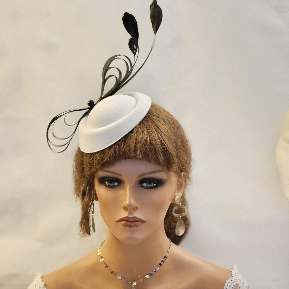 Black a white pillbox hat fascinator