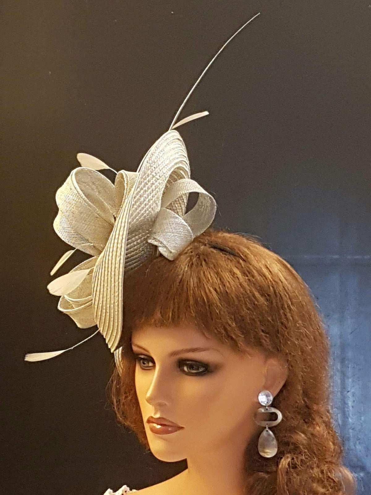 Silver grey fascinator with long quill feather forRaces and wedding