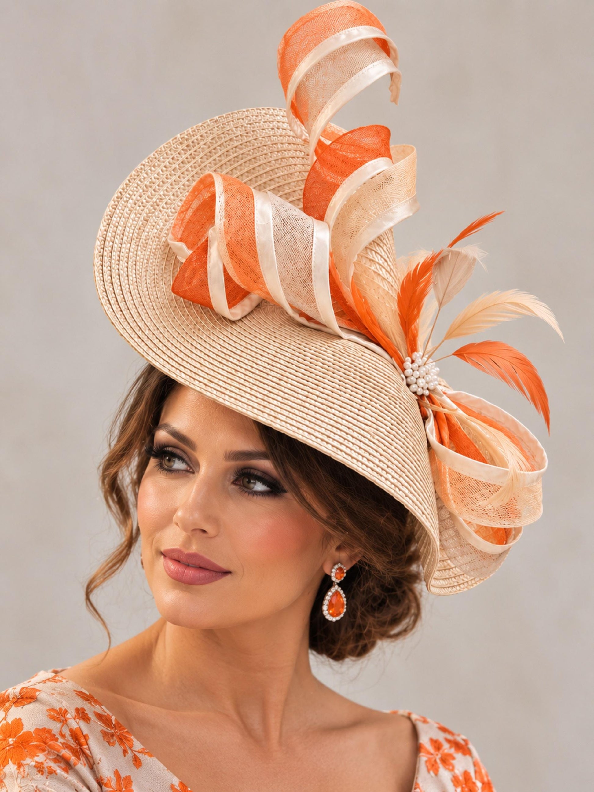 Beige facinator with orange feathers and crinoline swirls for Ascot,Derby and wedding